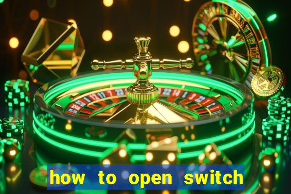 how to open switch oled game card slot